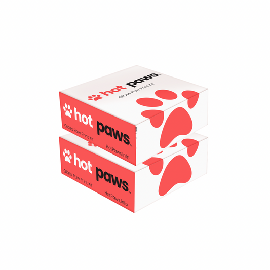 Two boxes of 'Hot Paws' on a white background